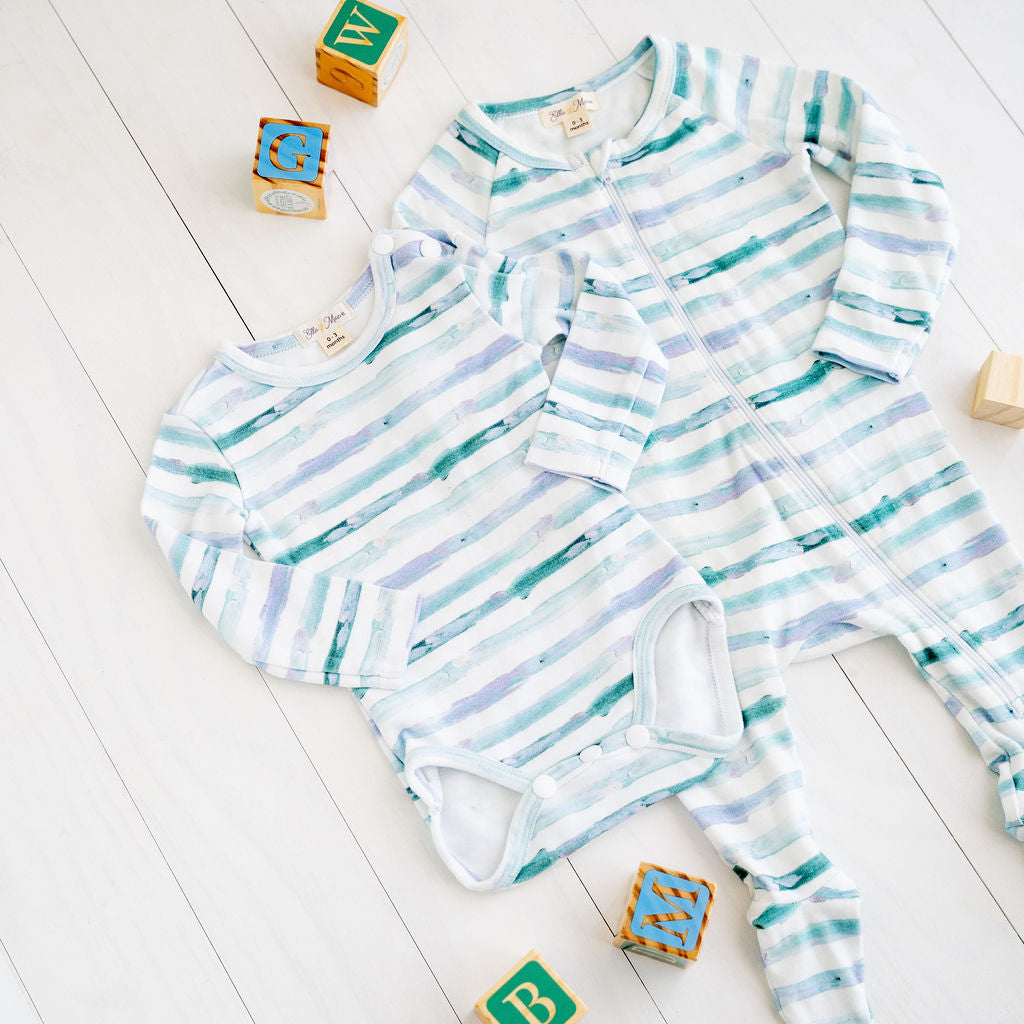 100% organic cotton romper and onesie made in Australia benefits for children and babies with eczema and skin conditions. Designed to fit cloth nappies.